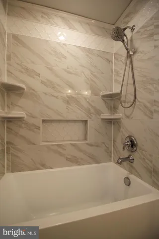 a bathroom with a bathtub