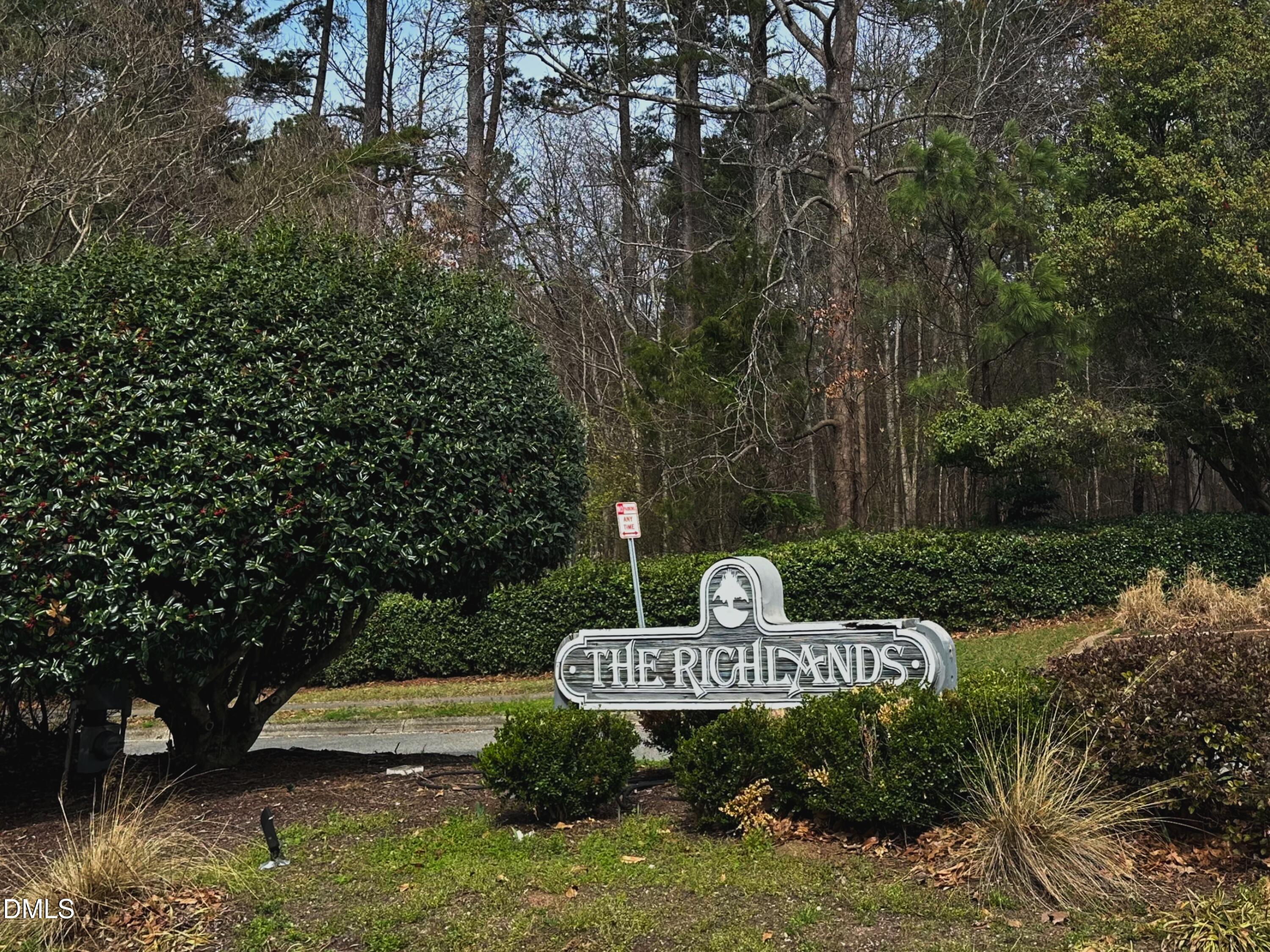4641 Timbermill Court, Unit 302 Raleigh, NC 27612 - Photo 23 of 27 a garden view with a tree