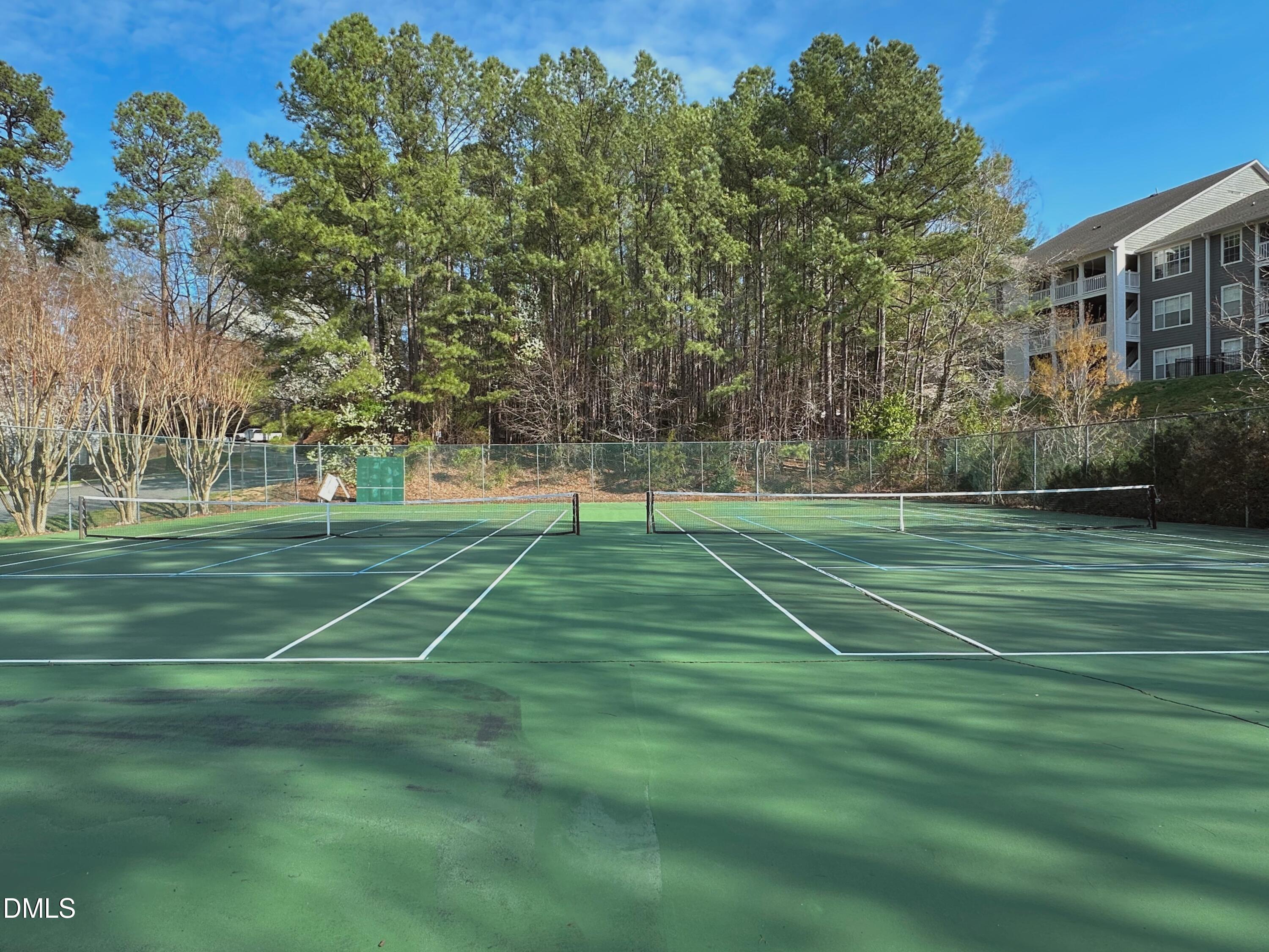 4641 Timbermill Court, Unit 302 Raleigh, NC 27612 - Photo 26 of 27 a view of a park with large trees