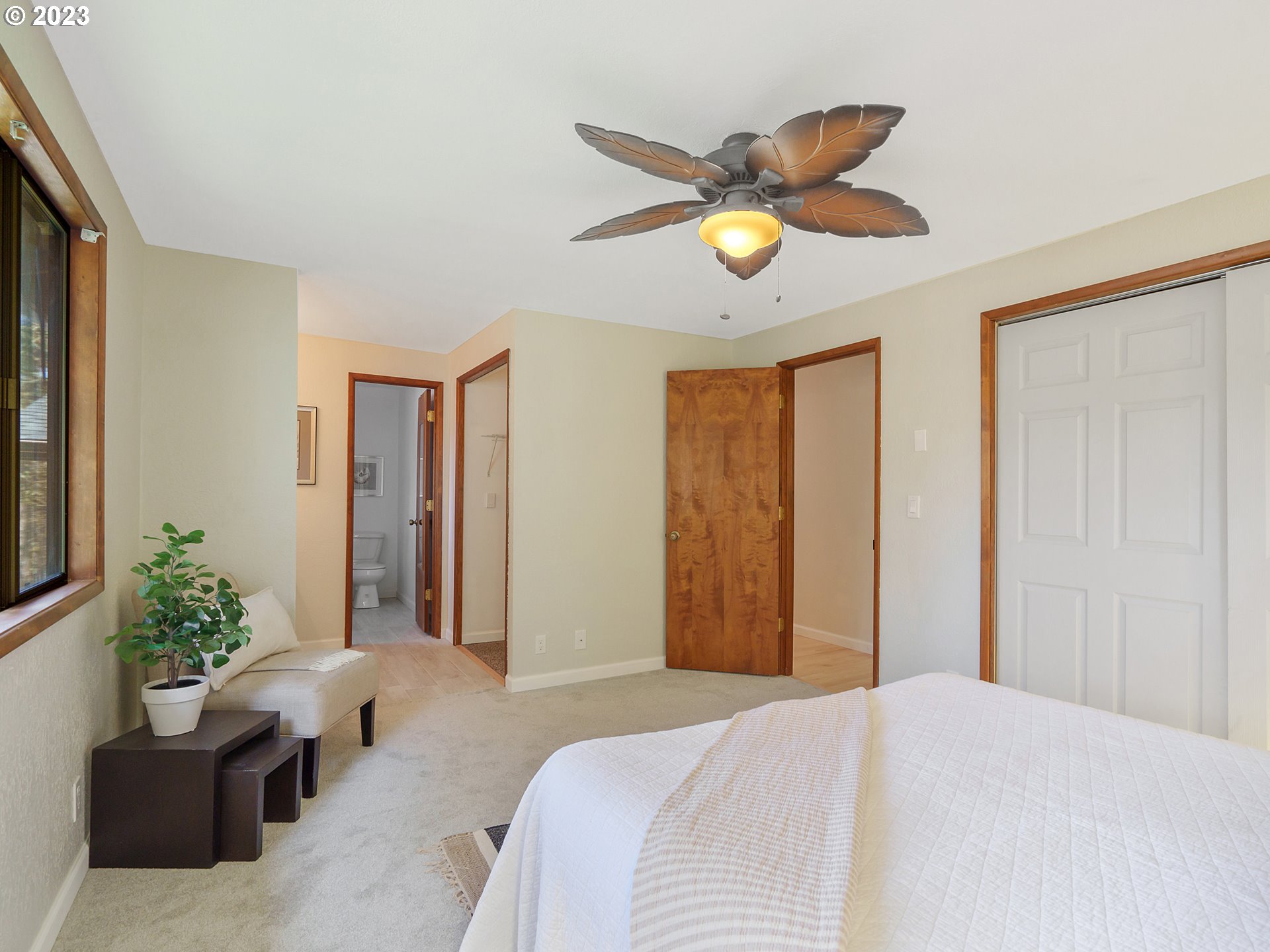1009 South 70th Street Springfield, OR 97478 - Photo 29 of 48 a bedroom with a bed and a chandelier