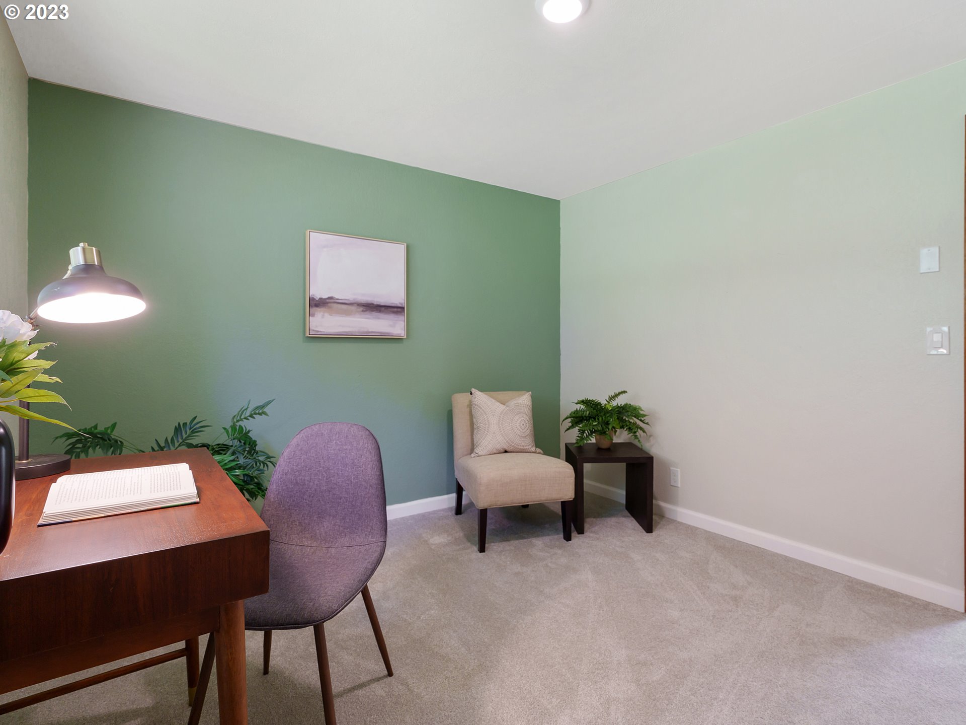 1009 South 70th Street Springfield, OR 97478 - Photo 34 of 48 a workspace with furniture and a potted plant