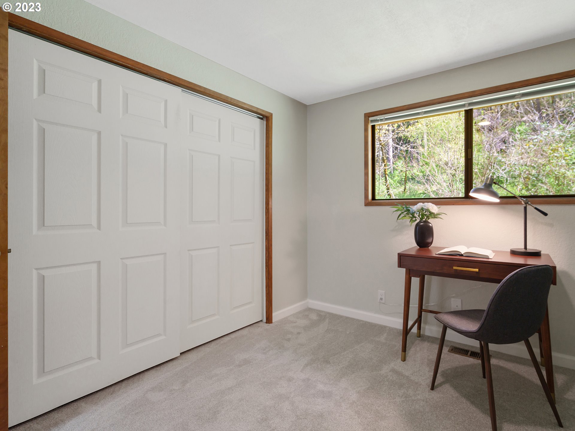 1009 South 70th Street Springfield, OR 97478 - Photo 36 of 48 a workspace with furniture and a window