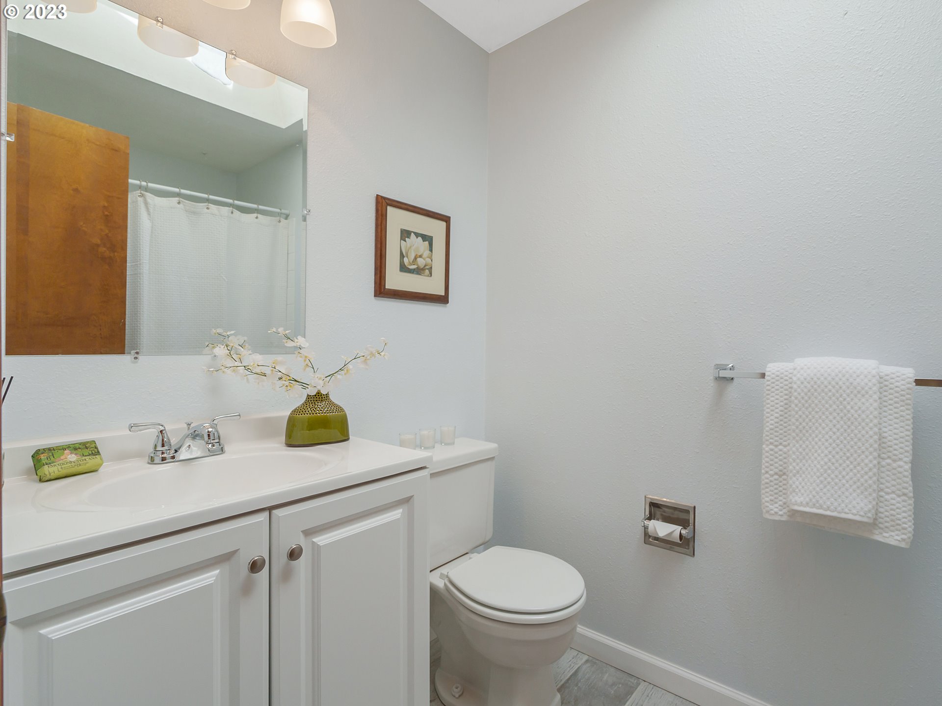 1009 South 70th Street Springfield, OR 97478 - Photo 40 of 48 a bathroom with a sink and a toilet