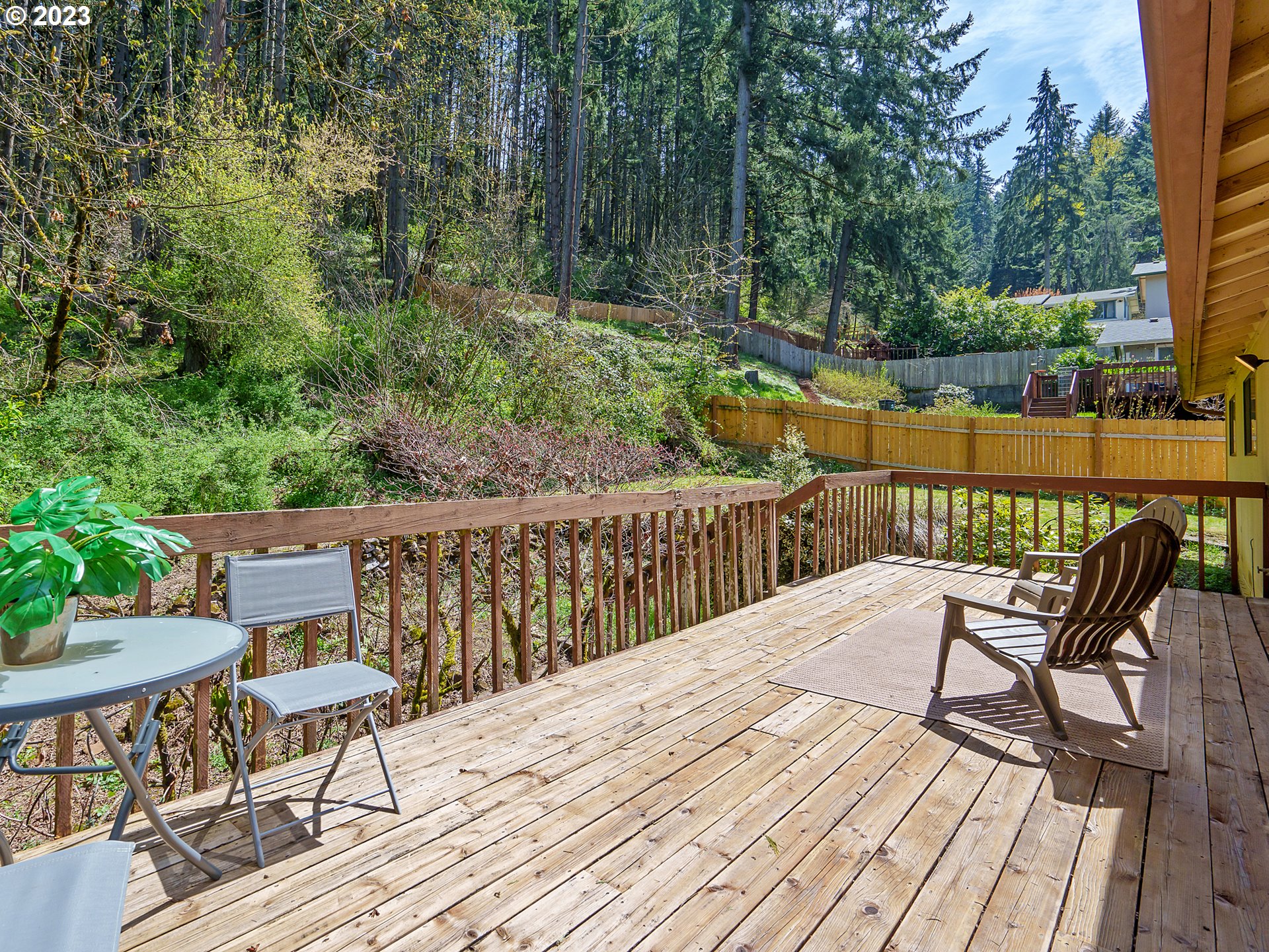 1009 South 70th Street Springfield, OR 97478 - Photo 41 of 48 a view of a chairs on wooden deck
