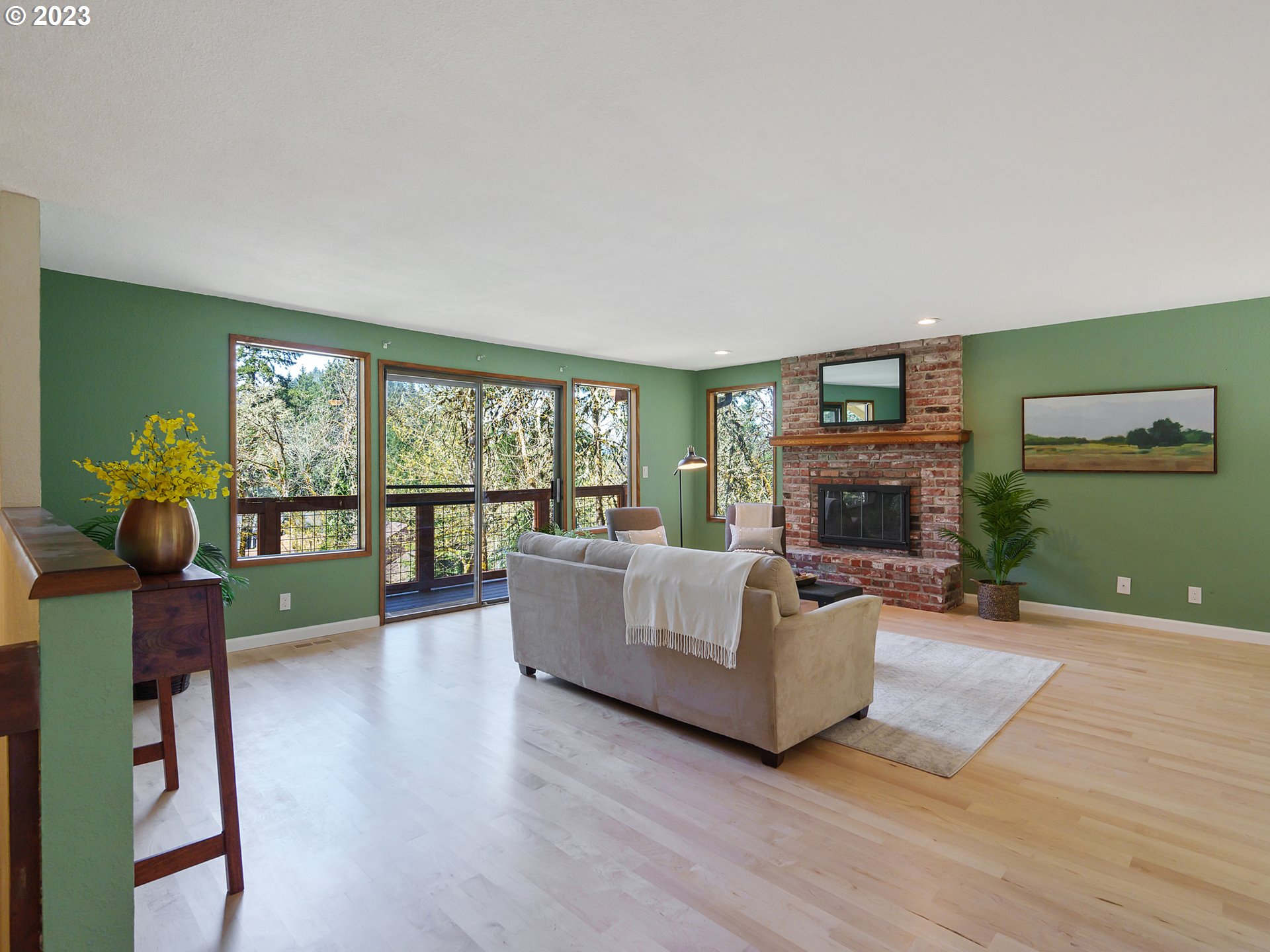 1009 South 70th Street Springfield, OR 97478 - Photo 5 of 48 a living room with furniture and a fireplace