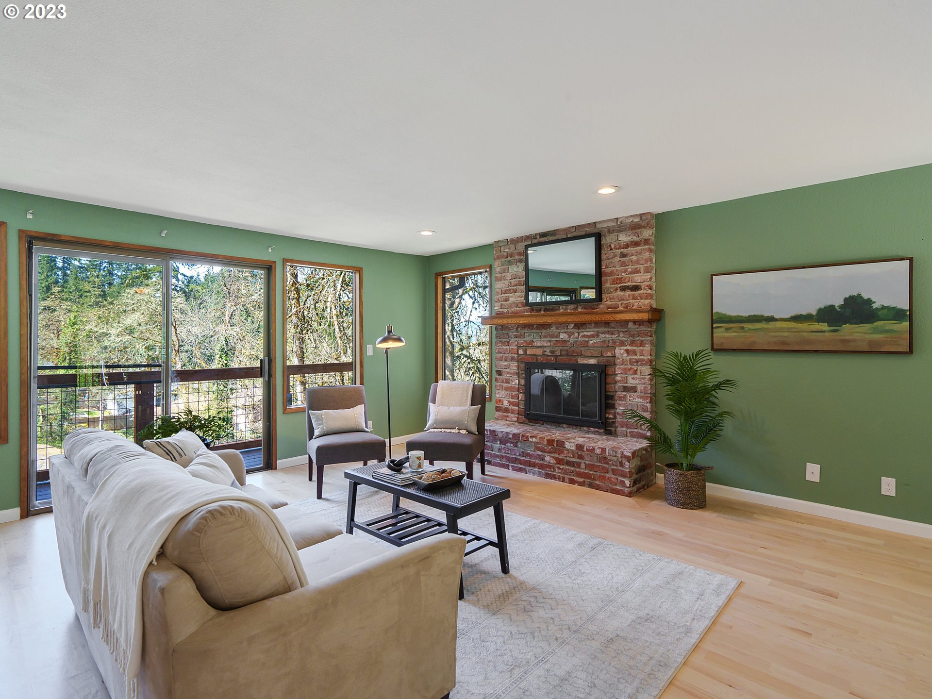 1009 South 70th Street Springfield, OR 97478 - Photo 6 of 48 a living room with furniture large window and fireplace