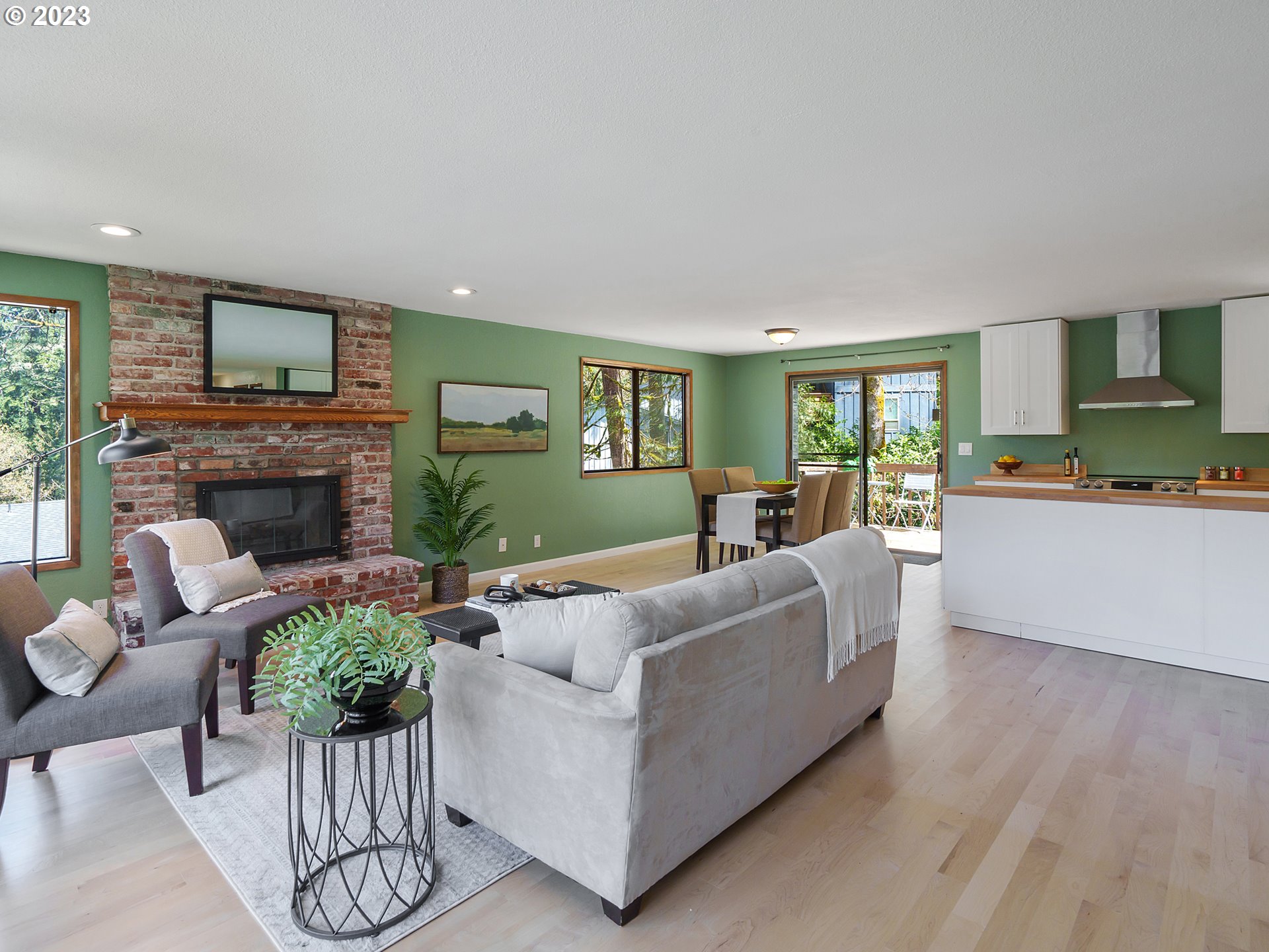 1009 South 70th Street Springfield, OR 97478 - Photo 7 of 48 a living room with furniture and a fireplace