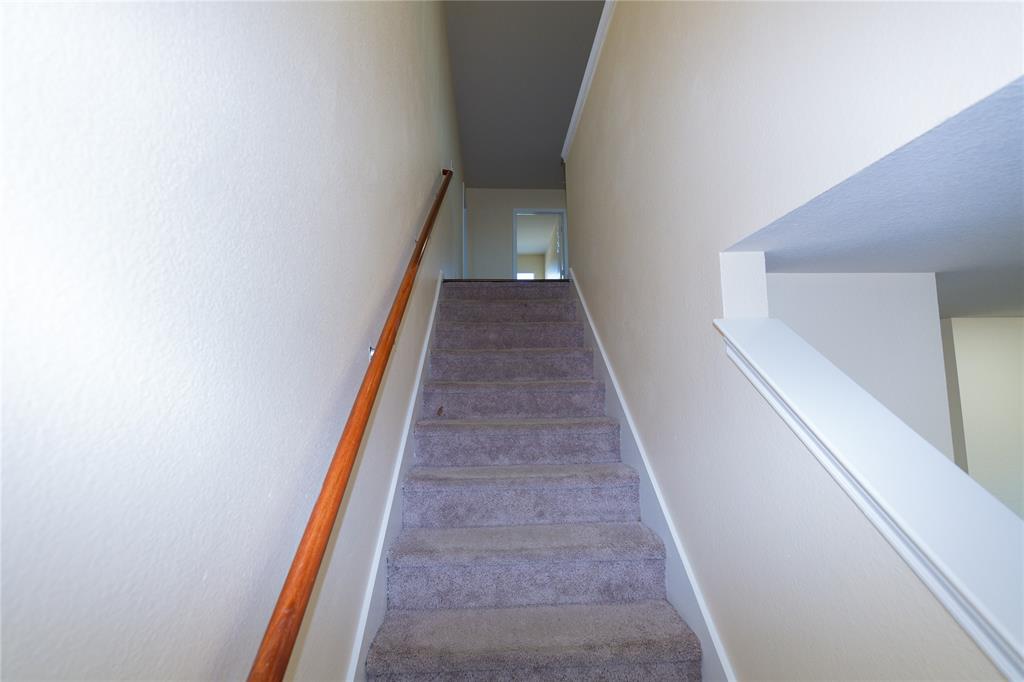 1717 Shawnee Trail Allen, TX 75002 - Photo 15 of 35 a view of a hallway with a white door