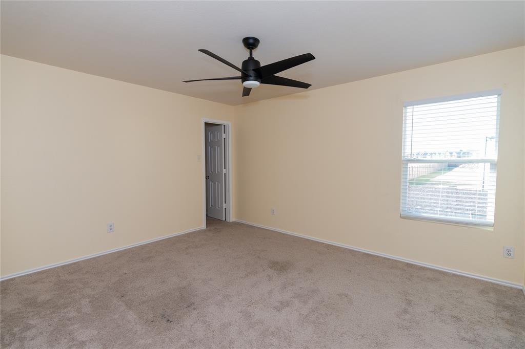 1717 Shawnee Trail Allen, TX 75002 - Photo 17 of 35 a view of a livingroom with a ceiling fan and window