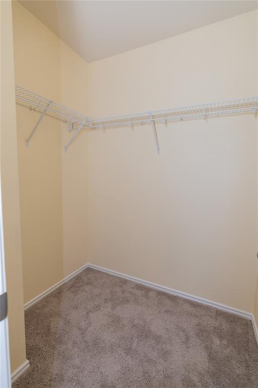 1717 Shawnee Trail Allen, TX 75002 - Photo 18 of 35 a view of an empty walk in closet
