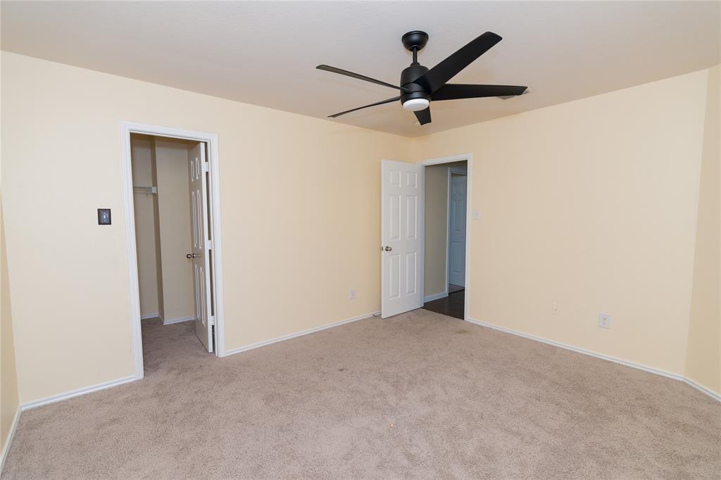 1717 Shawnee Trail Allen, TX 75002 - Photo 21 of 35 a view of a big room with a ceiling fan