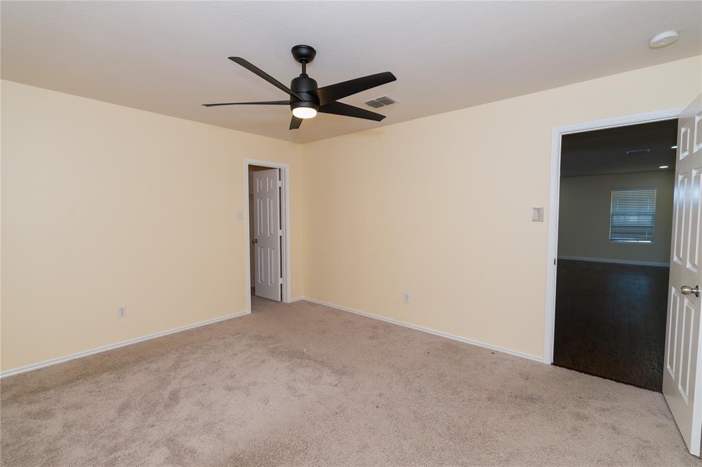 1717 Shawnee Trail Allen, TX 75002 - Photo 25 of 35 a view of a big room with a ceiling fan and a ceiling fan