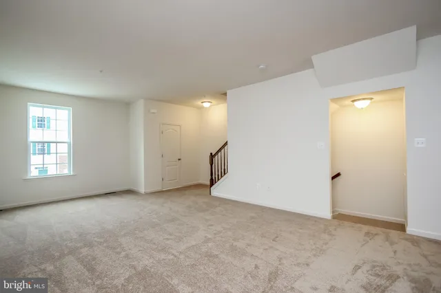 an empty room with a natural light