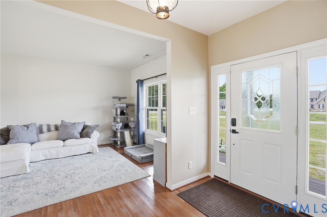 5305 Wellington Ridge Road Richmond, VA 23231 - Photo 11 of 67 Entryway featuring a white door with decorative gl