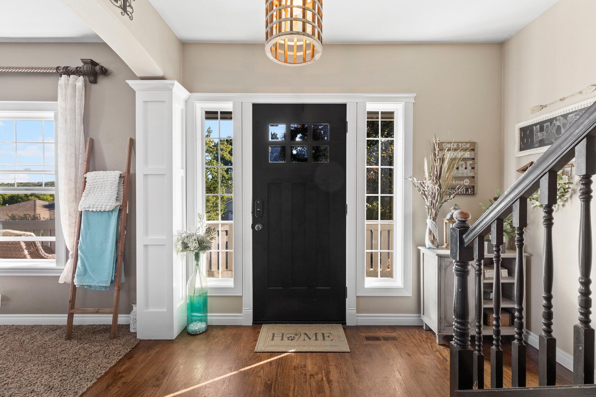 878 Ridgeview Drive Eagle Point, OR 97524 - Photo 4 of 39 a view of an entryway with wooden floor and windows