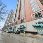 a view of a building with a car park