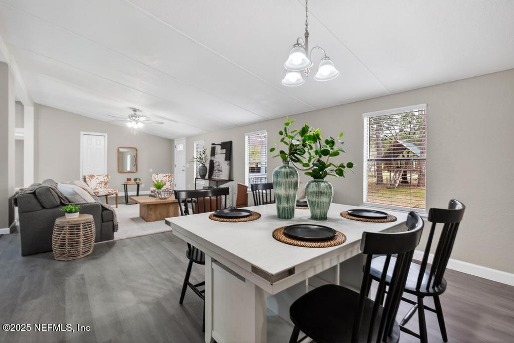 95422 Plum Loop Fernandina Beach, FL 32034 - Photo 20 of 76 a view of a dining room with furniture and wooden floor