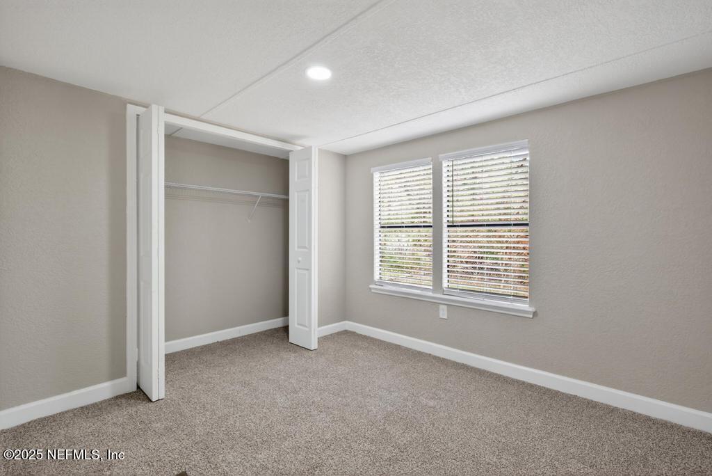 95422 Plum Loop Fernandina Beach, FL 32034 - Photo 51 of 76 a view of an empty room with a window
