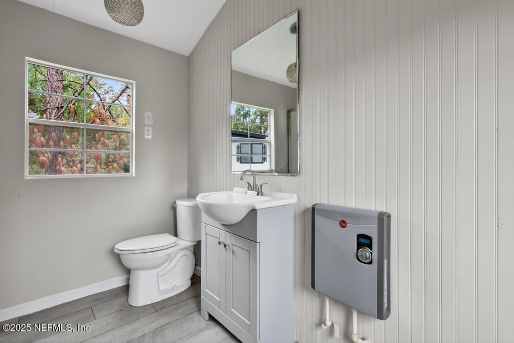 95422 Plum Loop Fernandina Beach, FL 32034 - Photo 58 of 76 a bathroom with a sink toilet and window