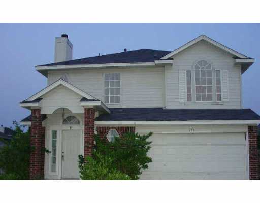 170 Riley Cove Kyle, TX 78640 - Photo 1 of 1 a front view of a house with a yard