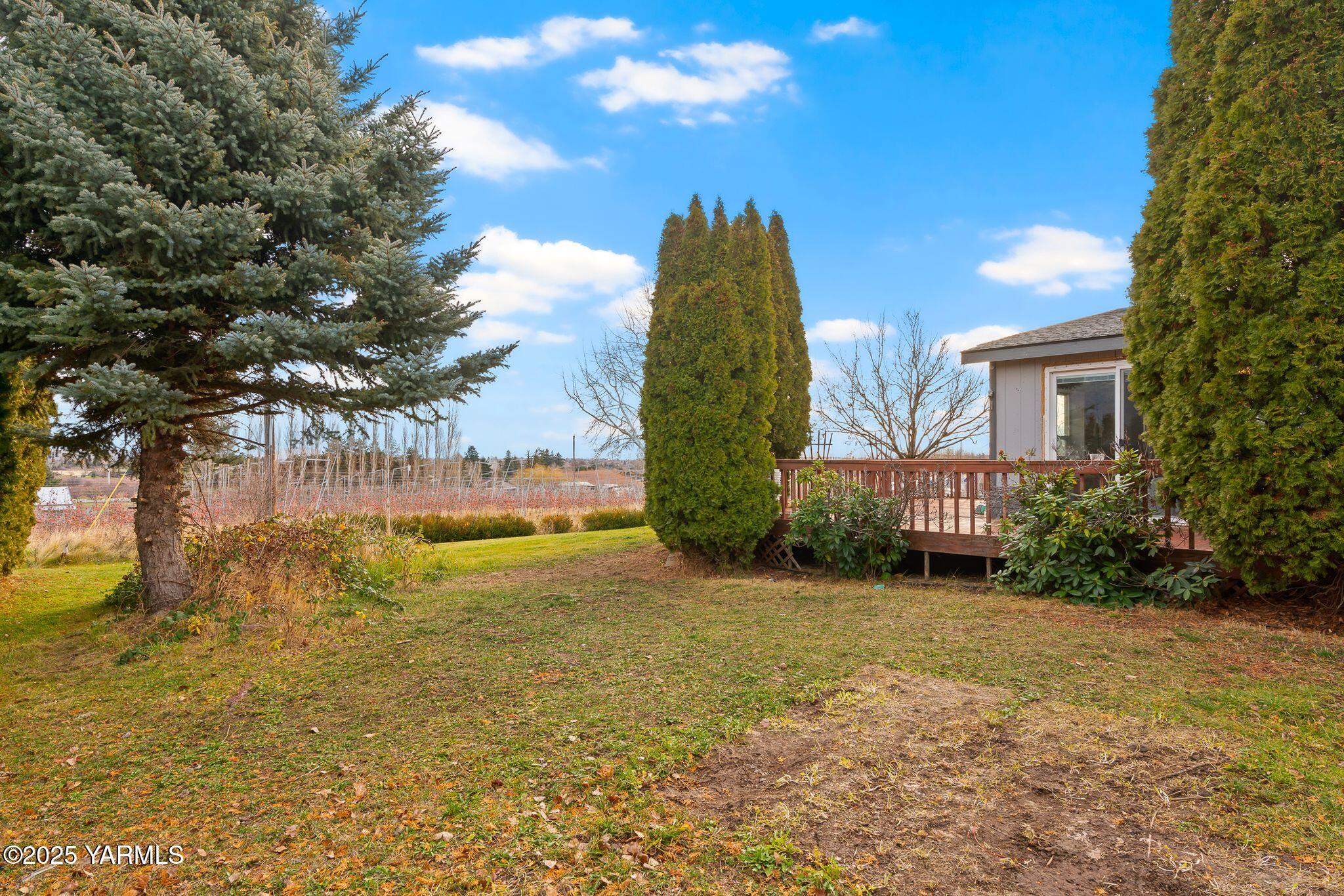 1880 Franklin Road Tieton, WA 98947 - Photo 19 of 29 a view of a house with a yard and potted plants