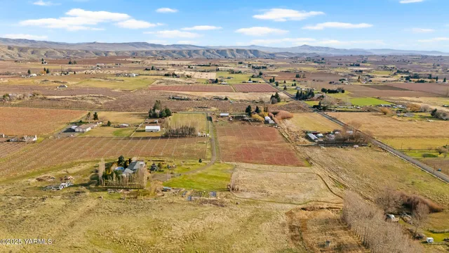 a view of an ocean and a mountain