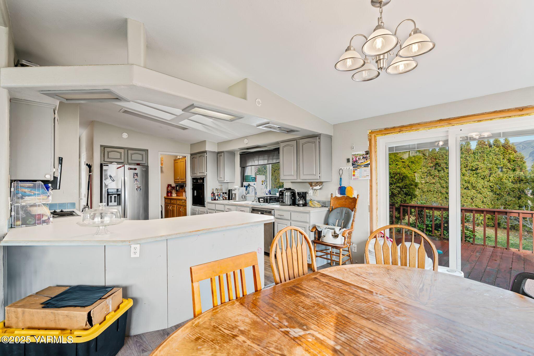 1880 Franklin Road Tieton, WA 98947 - Photo 7 of 29 a view of a dining room with furniture window and outside view