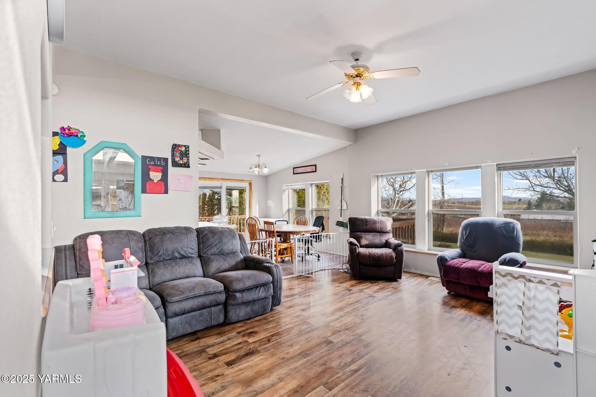 1880 Franklin Road Tieton, WA 98947 - Photo 8 of 29 a living room with furniture and a chandelier