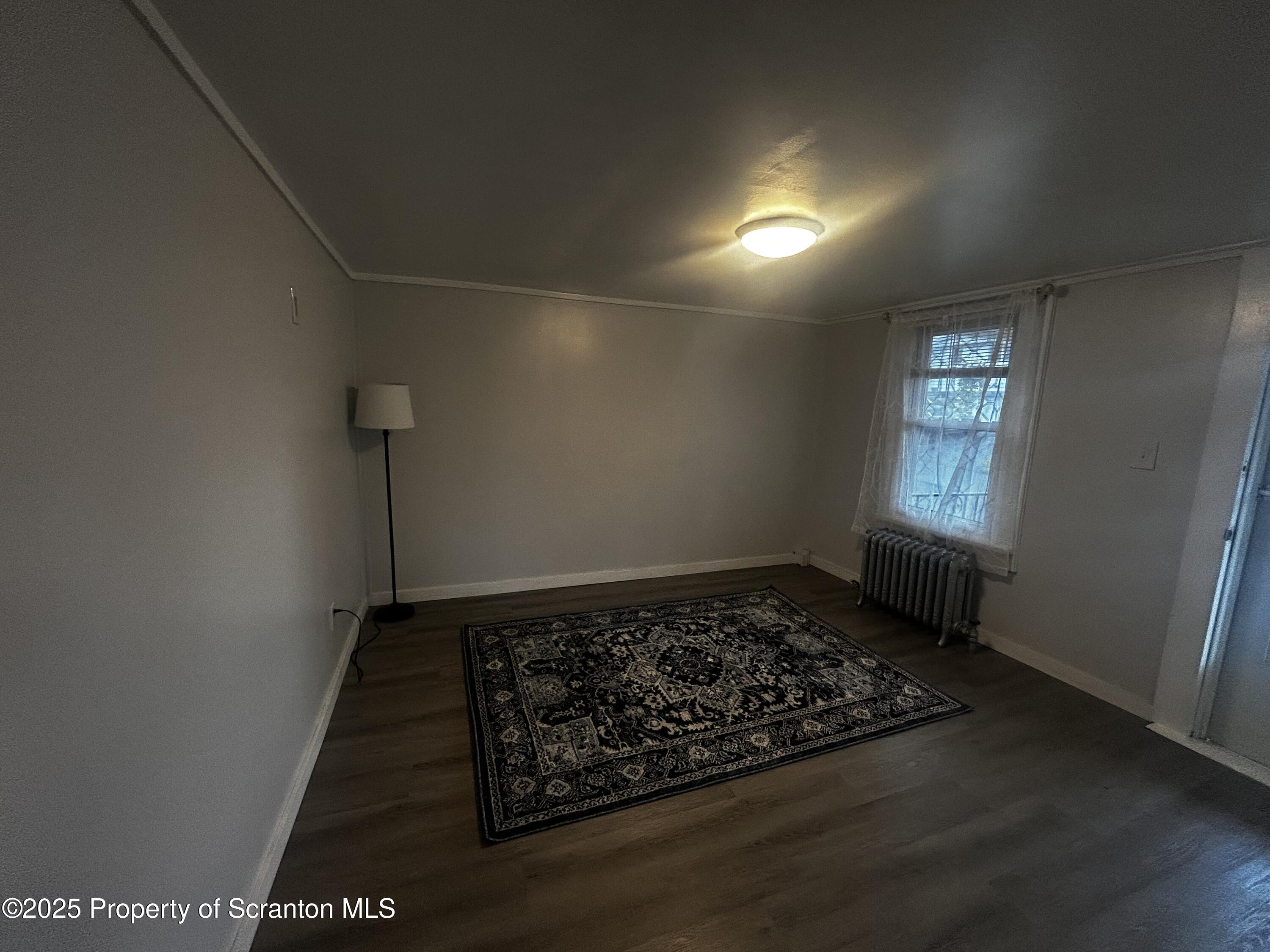 1214 Mine Street Old Forge, PA 18518 - Photo 11 of 21 an empty room with windows