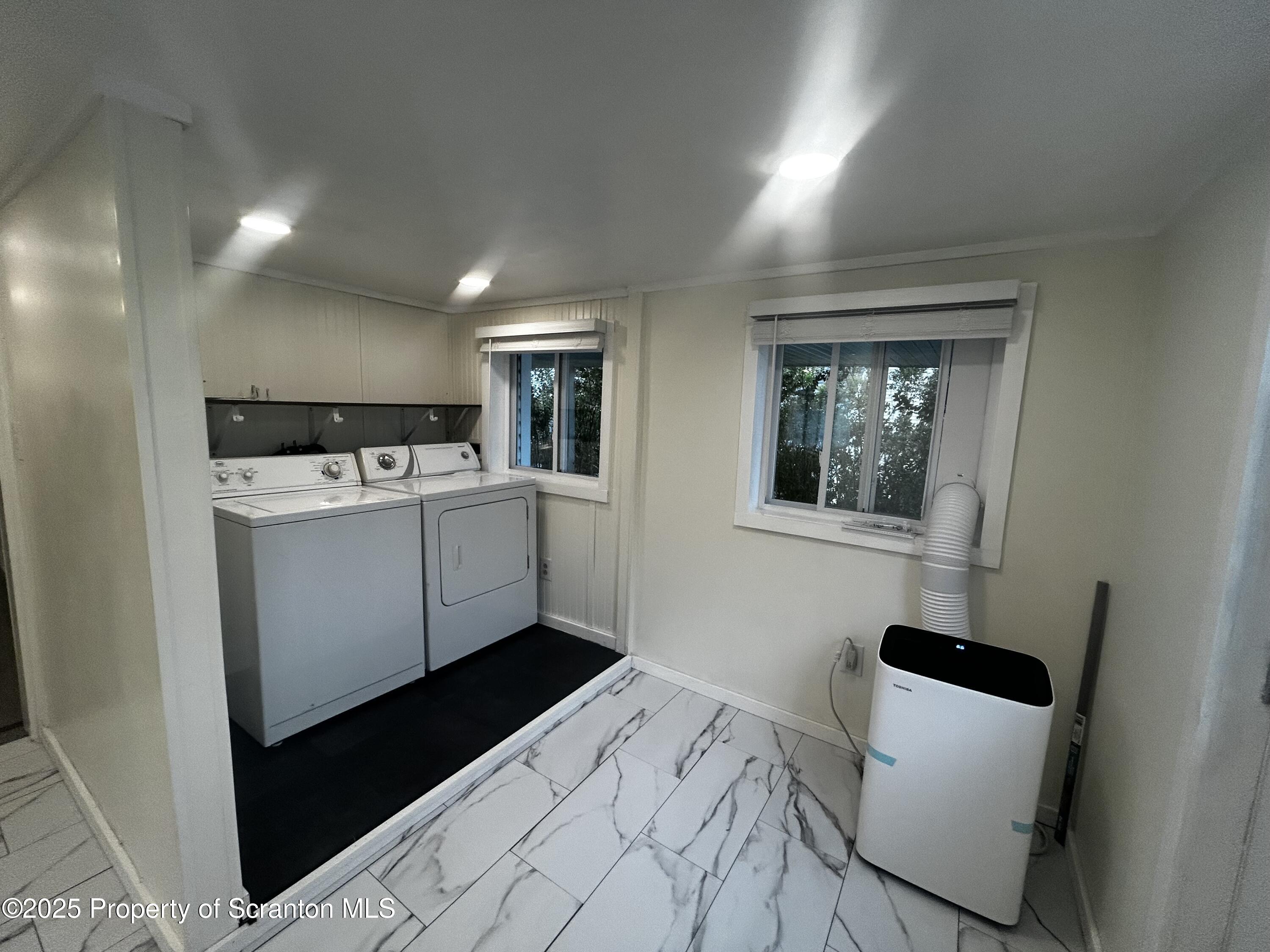 1214 Mine Street Old Forge, PA 18518 - Photo 18 of 21 a utility room with dryer and washer