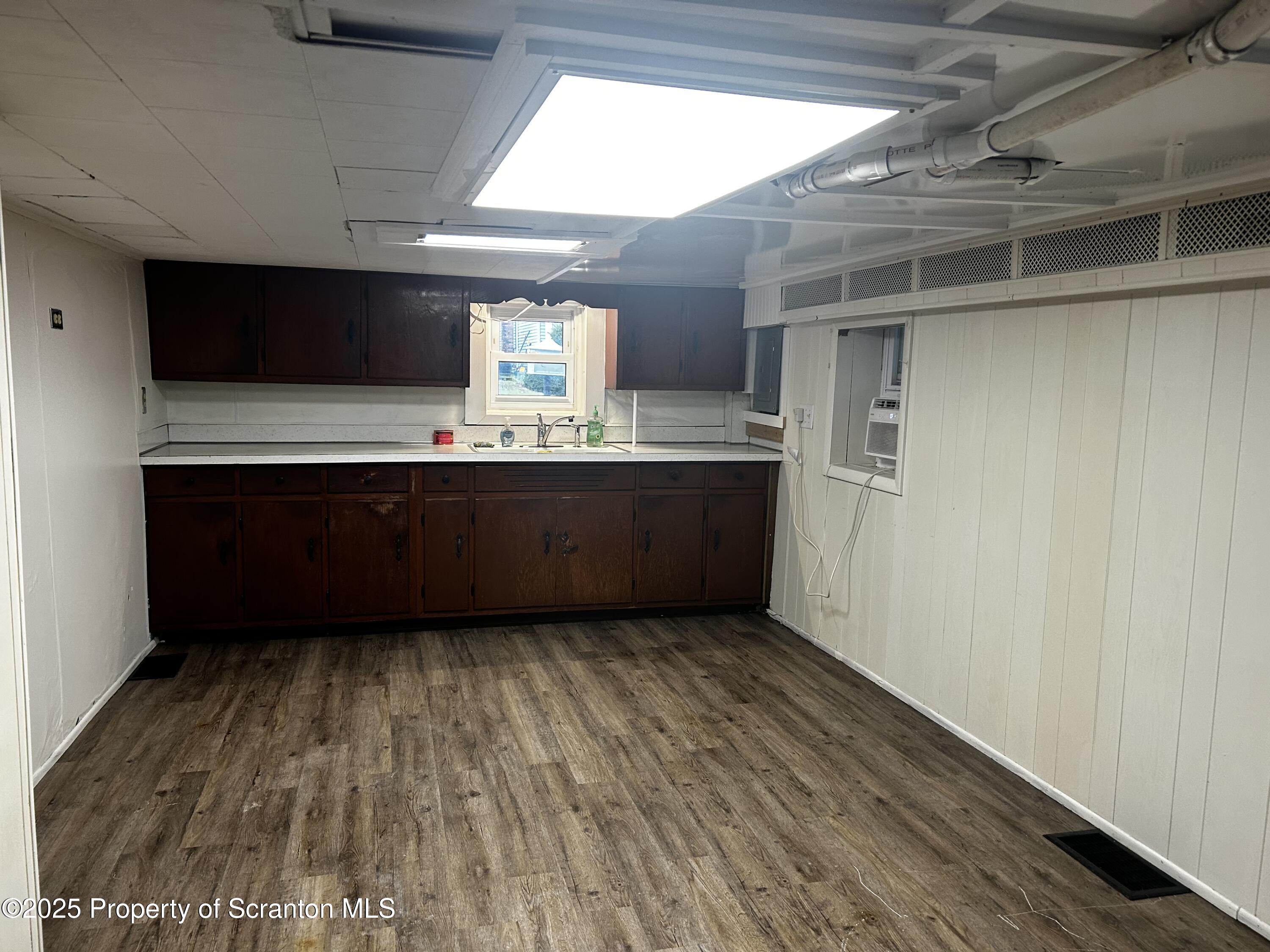 1214 Mine Street Old Forge, PA 18518 - Photo 19 of 21 a view of kitchen with wooden floor