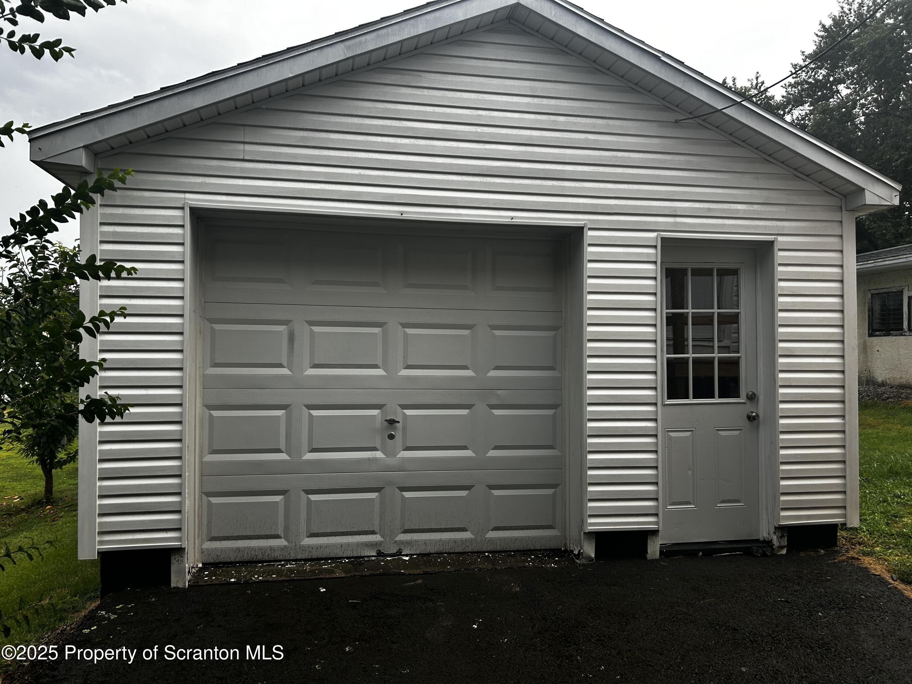 1214 Mine Street Old Forge, PA 18518 - Photo 5 of 21 a view of a house with a small yard
