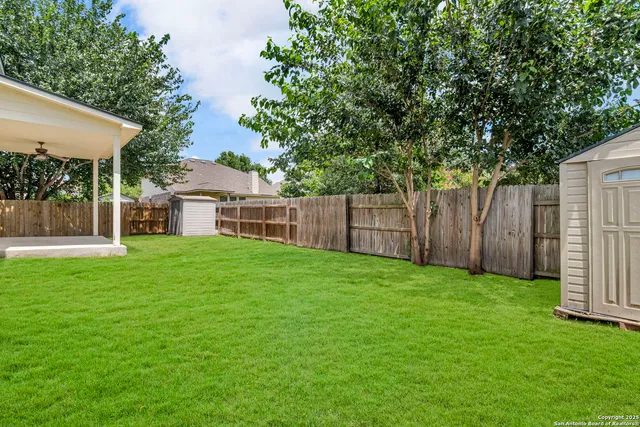 a view of a backyard with a garden