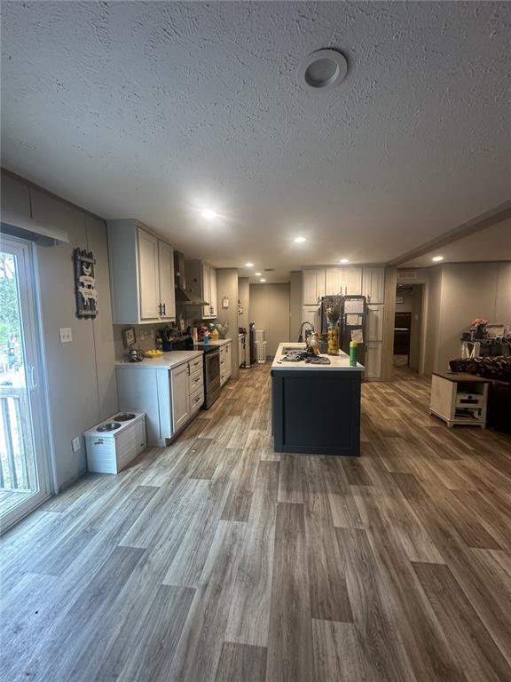 42833 Cooter Pond Road DeLand, FL 32720 - Photo 8 of 16 a large kitchen with a table and chairs