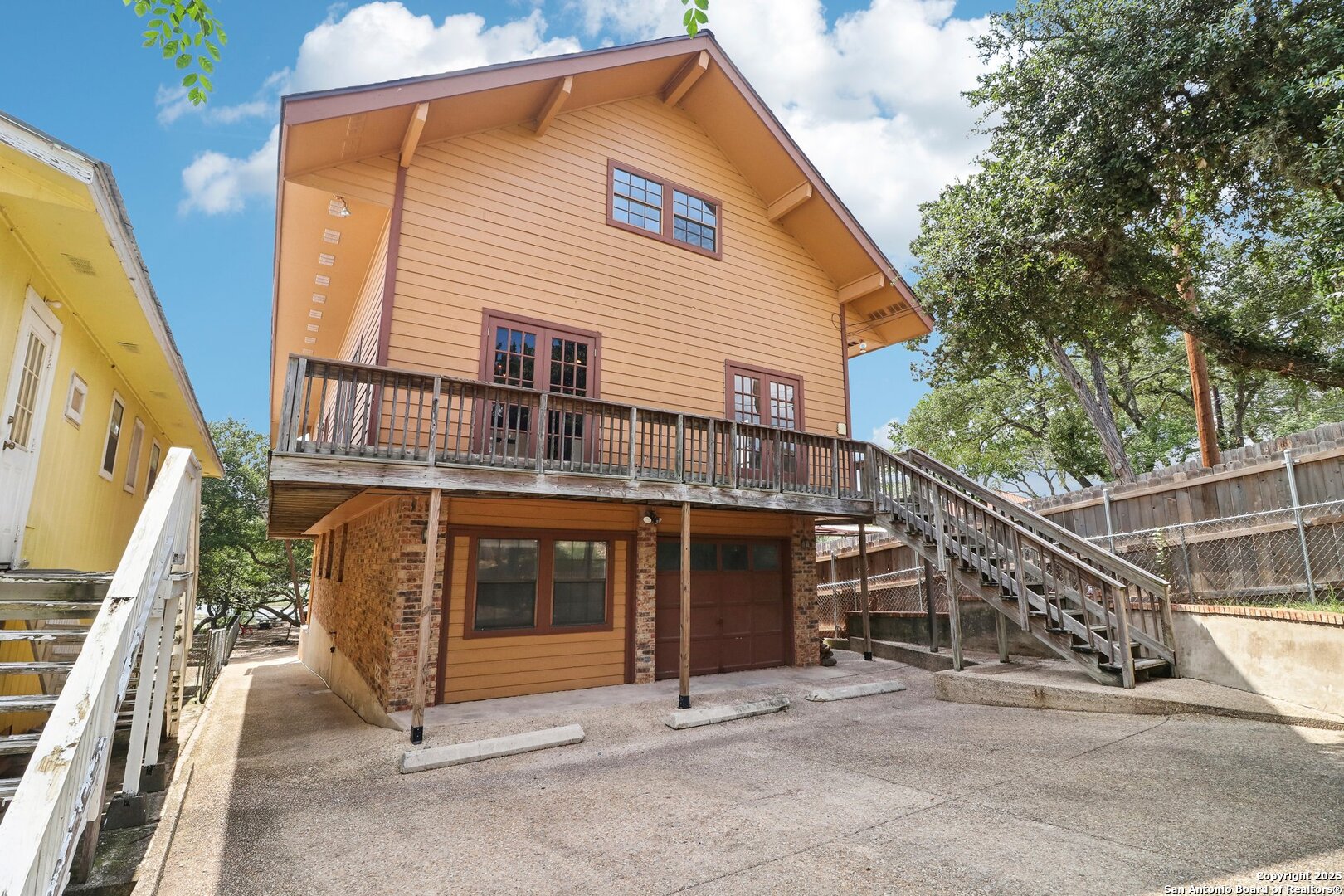 1551 Pebble Beach Road Lakehills, TX 78063 - Photo 11 of 46 a view of a house with a porch