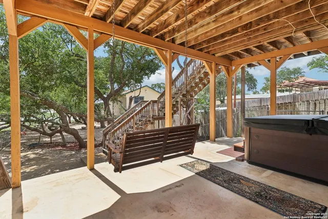 a view of outdoor space with deck and wooden floor