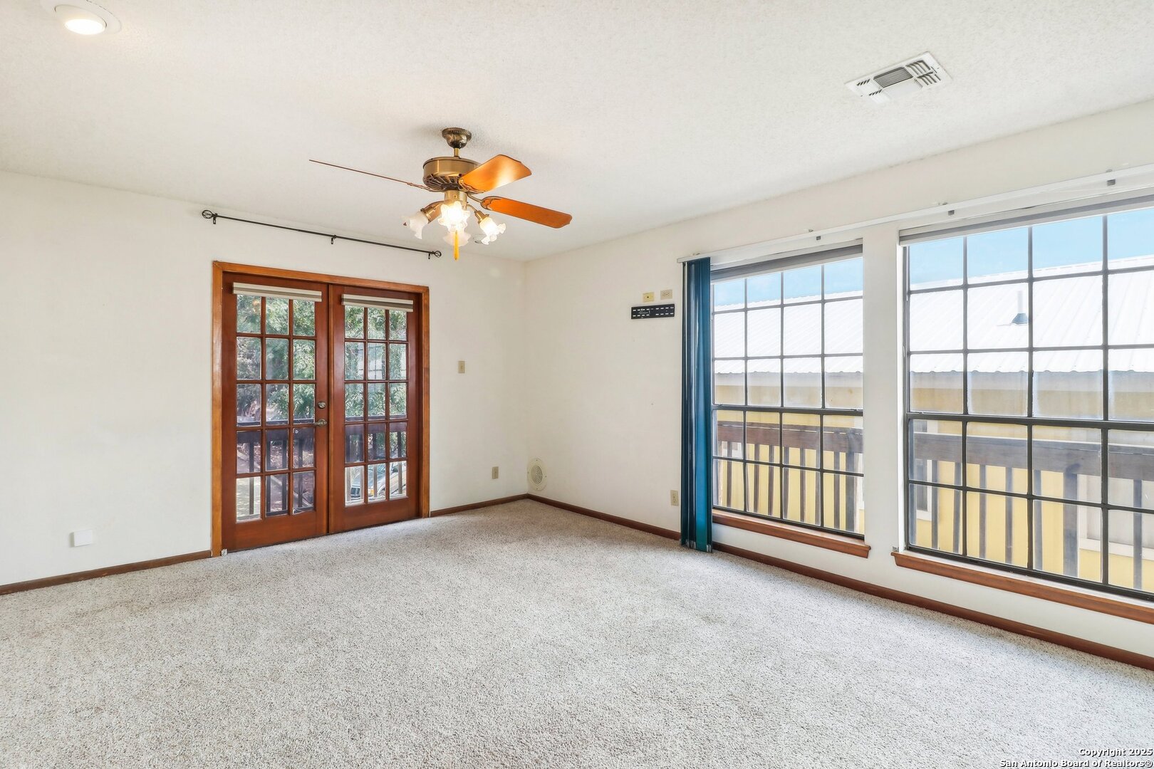 1551 Pebble Beach Road Lakehills, TX 78063 - Photo 26 of 46 a view of an empty room with a window