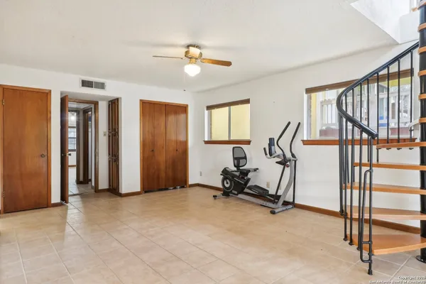 a view of a room with gym equipment