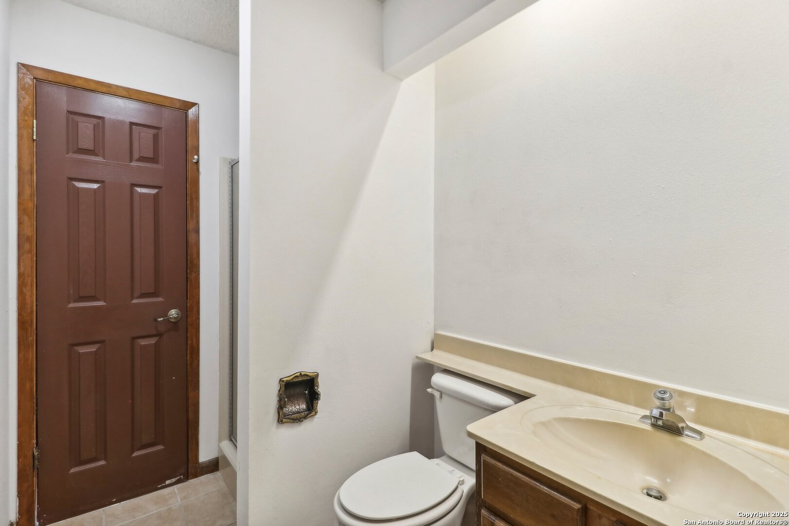 1551 Pebble Beach Road Lakehills, TX 78063 - Photo 30 of 46 a bathroom with a sink toilet and shower