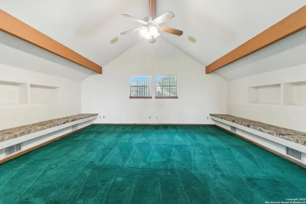 a view of a room with a flat screen tv