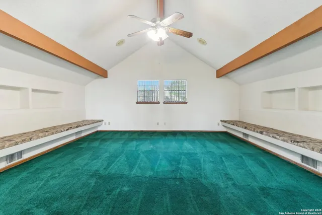 a view of a room with a flat screen tv