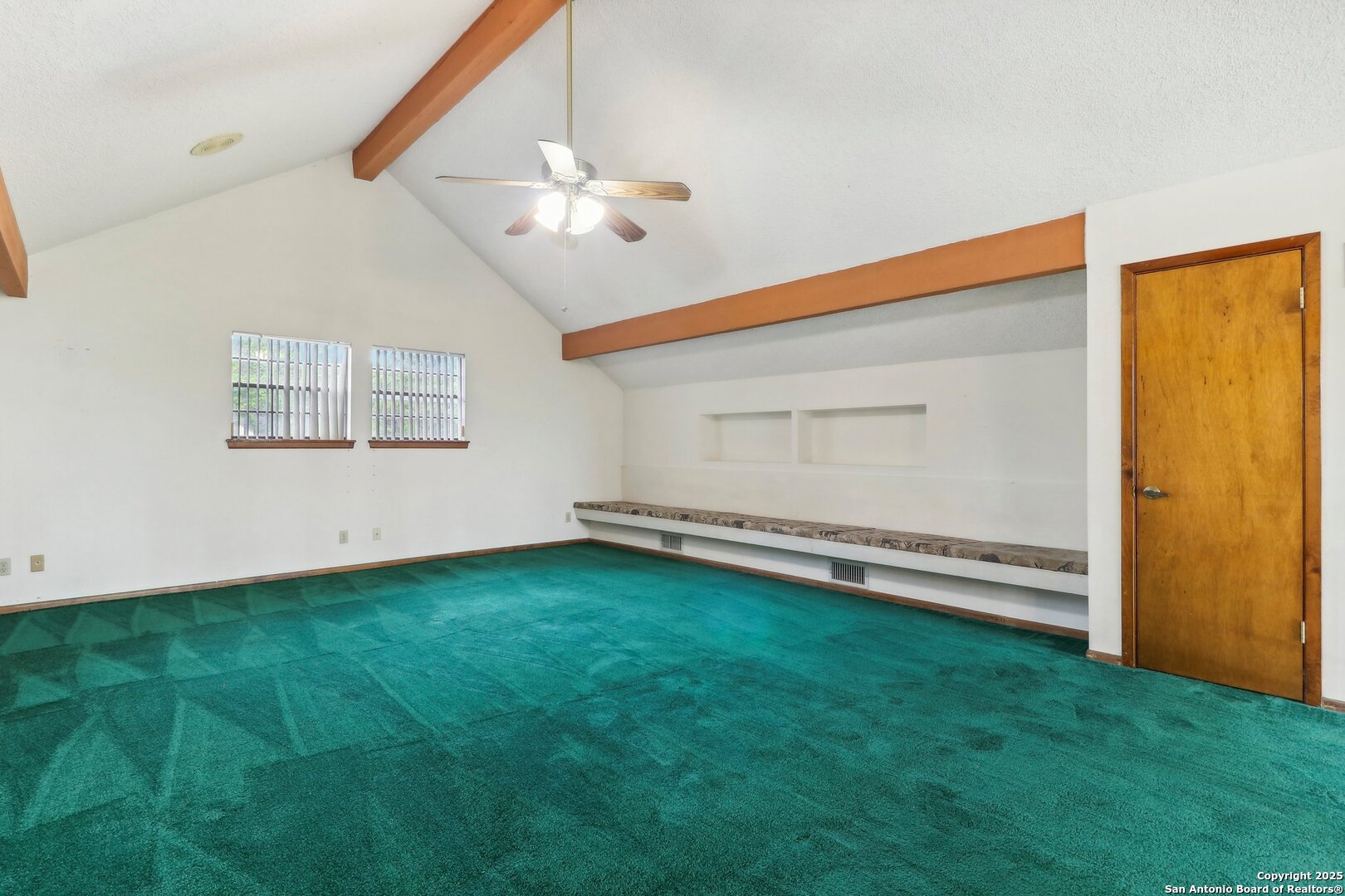 1551 Pebble Beach Road Lakehills, TX 78063 - Photo 34 of 46 wooden floor in an empty room with a window