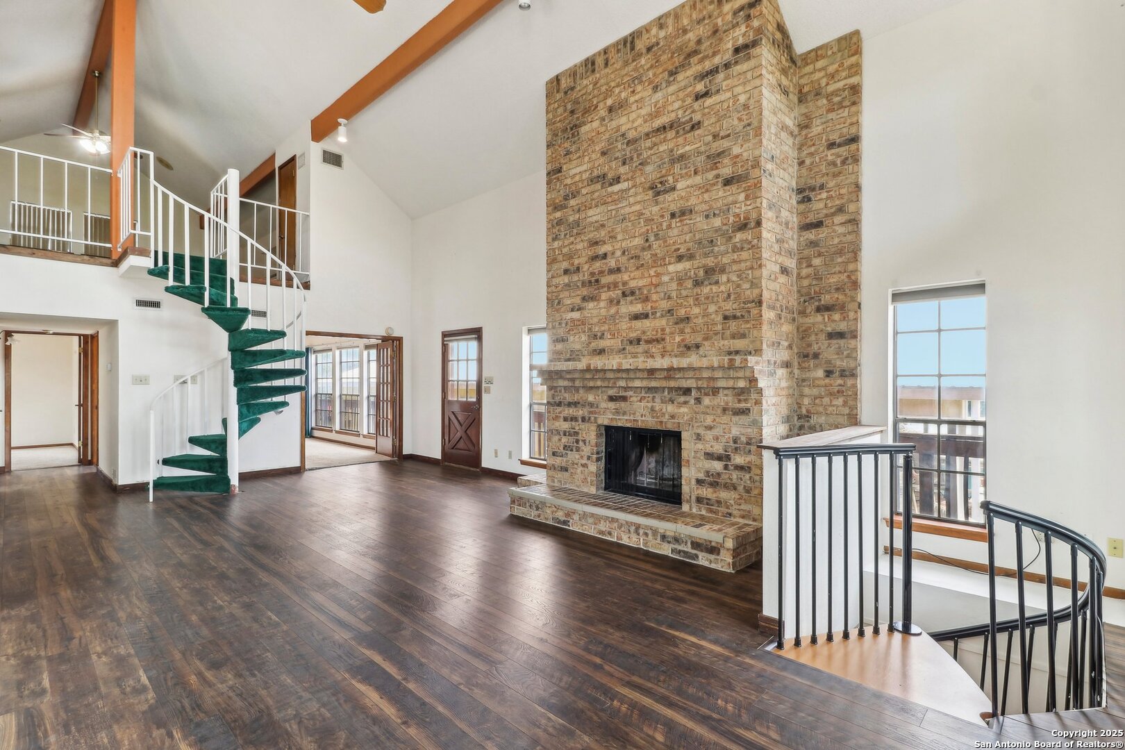 1551 Pebble Beach Road Lakehills, TX 78063 - Photo 10 of 46 a view of a livingroom with furniture and a fireplace