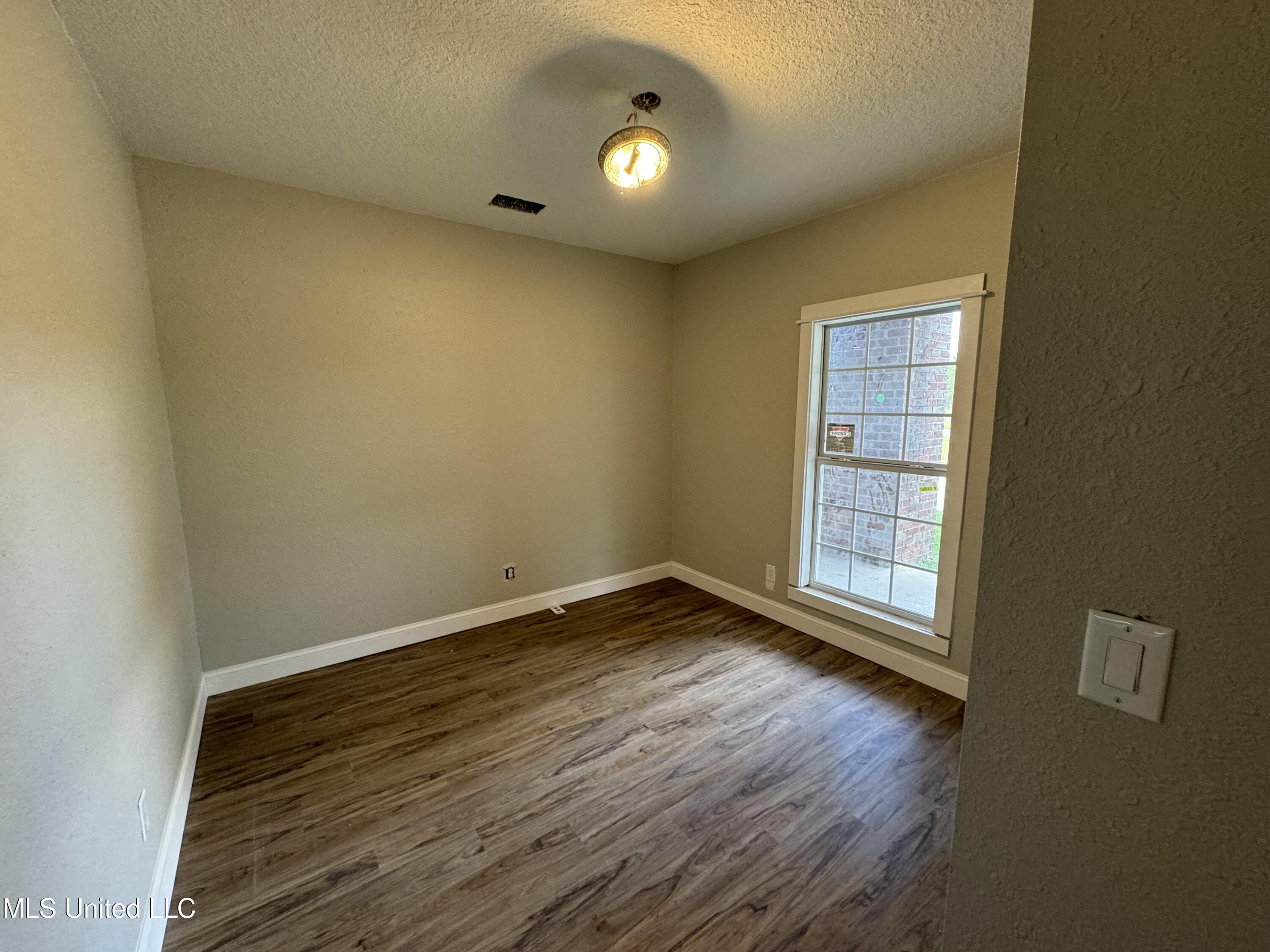 318 West McHenry Road Perkinston, MS 39573 - Photo 14 of 17 318 W - Spare Bedroom
