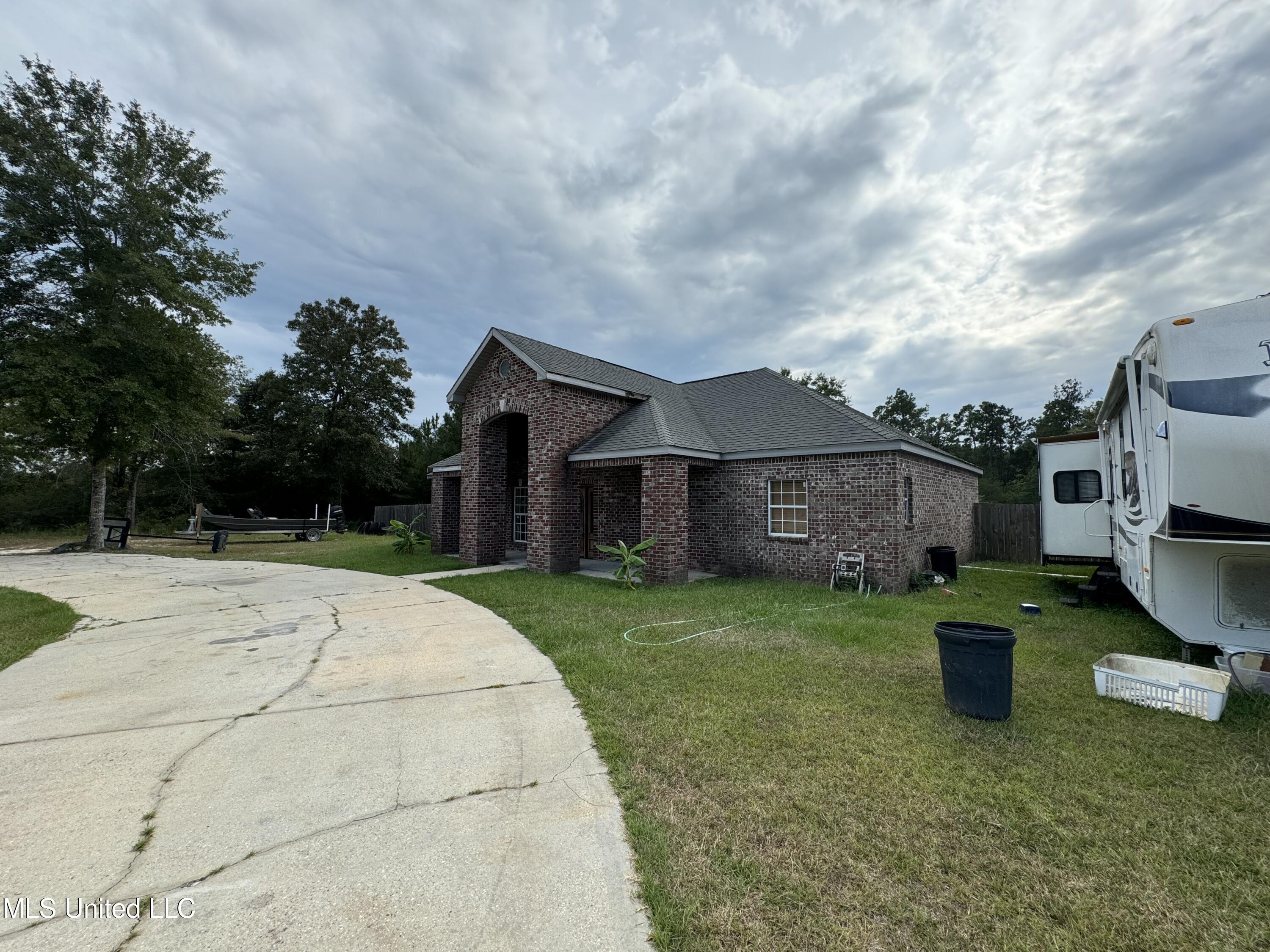 318 West McHenry Road Perkinston, MS 39573 - Photo 17 of 17 318 W - Side of house