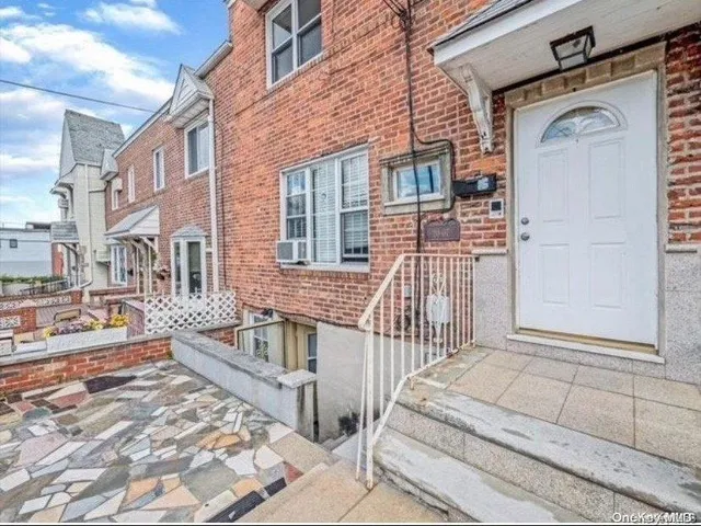 a view of a house with a large window