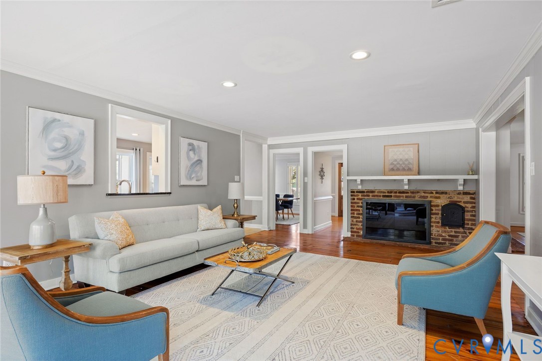 9804 Kingsbridge Road Henrico, VA 23238 - Photo 14 of 50 a living room with furniture and a fireplace