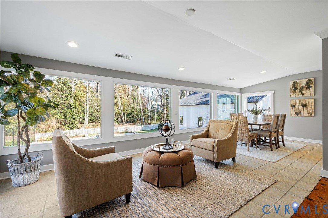 9804 Kingsbridge Road Henrico, VA 23238 - Photo 17 of 50 a living room with furniture and a large window