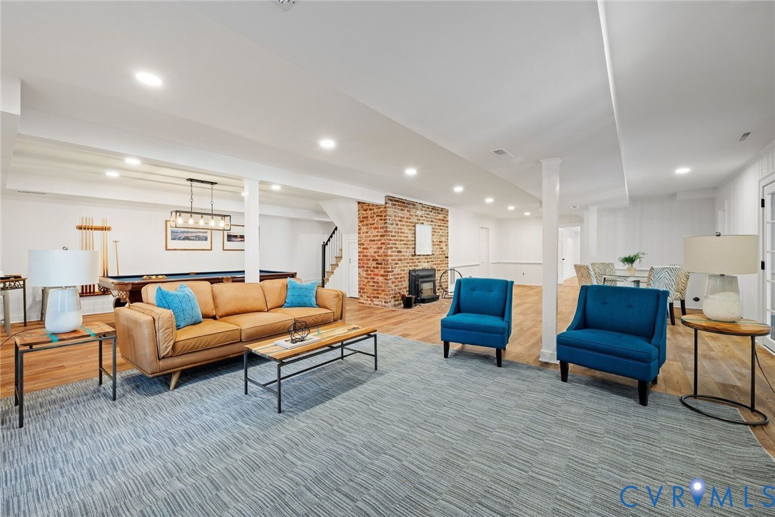 9804 Kingsbridge Road Henrico, VA 23238 - Photo 36 of 50 a living room with furniture and wooden floors