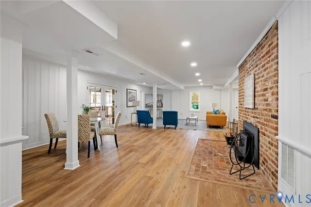 a view of a living room and dining room